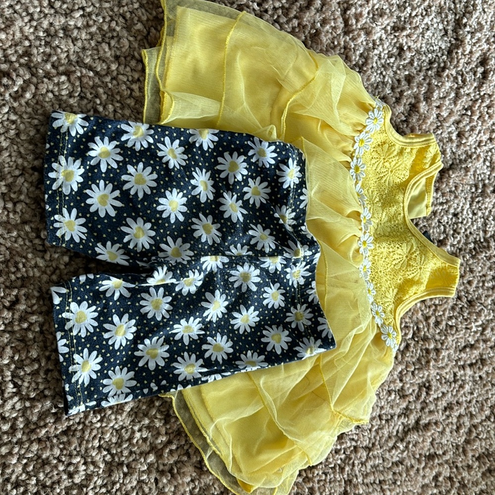 Yellow and blue ruffle shirt and flower pants